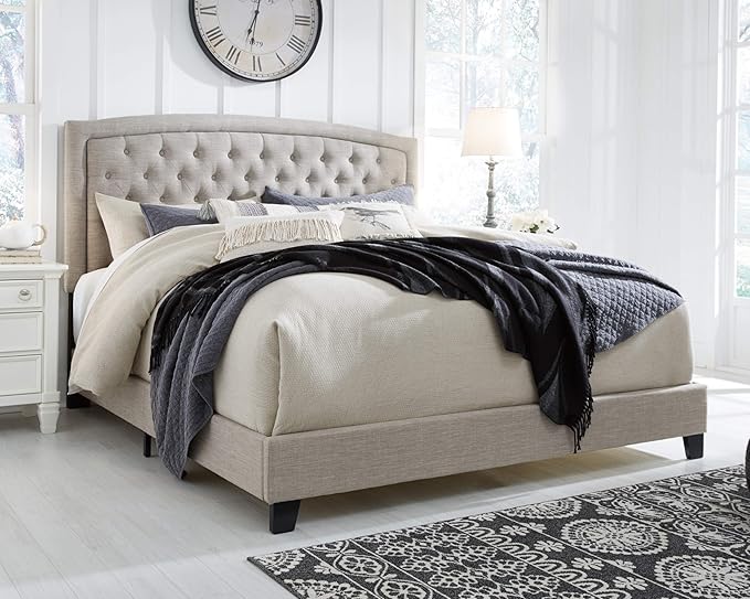 The jerary king upholstered bed blends modern aesthetics with practical design for any setting.