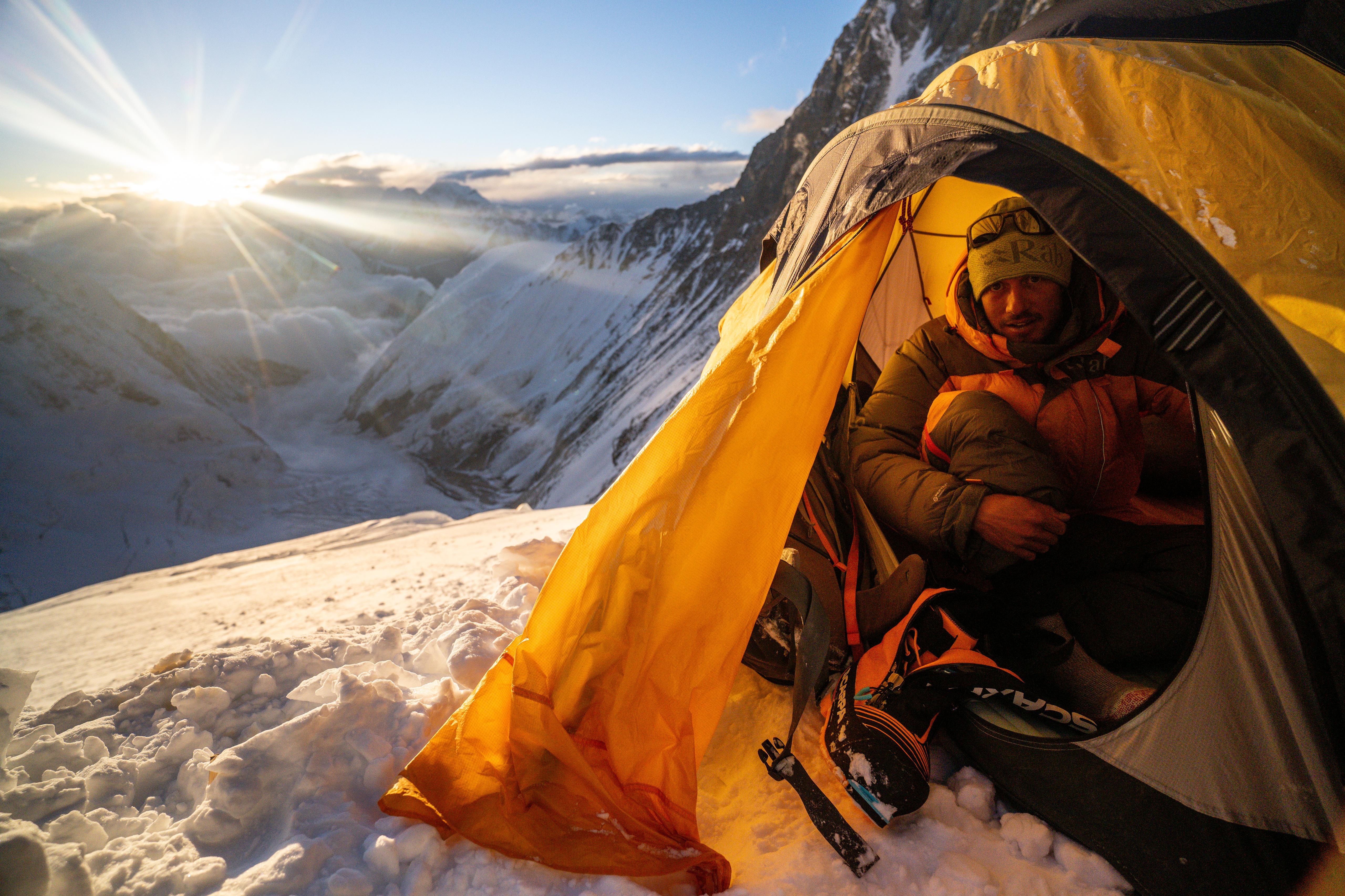 A man listening through headphones.