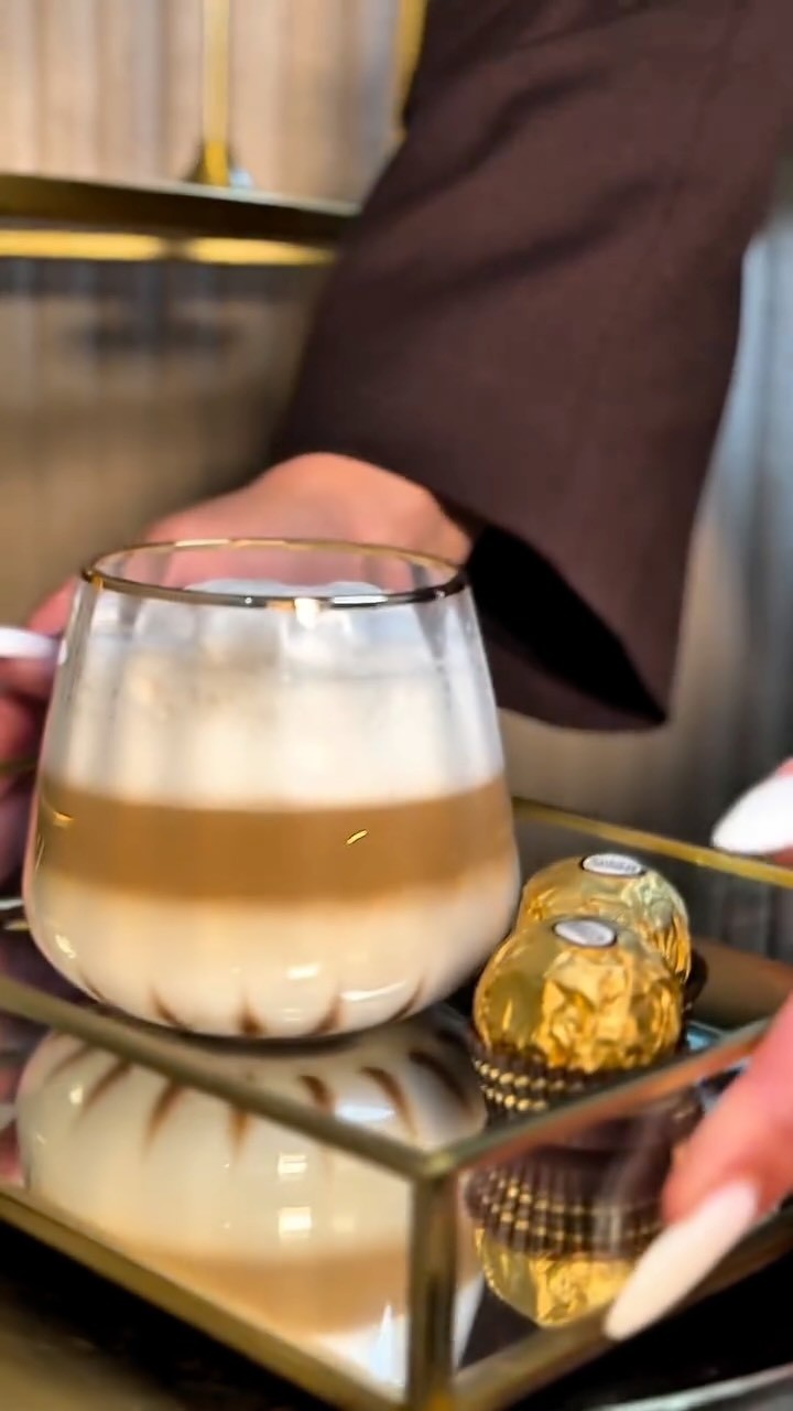 brunette with dark nail polish