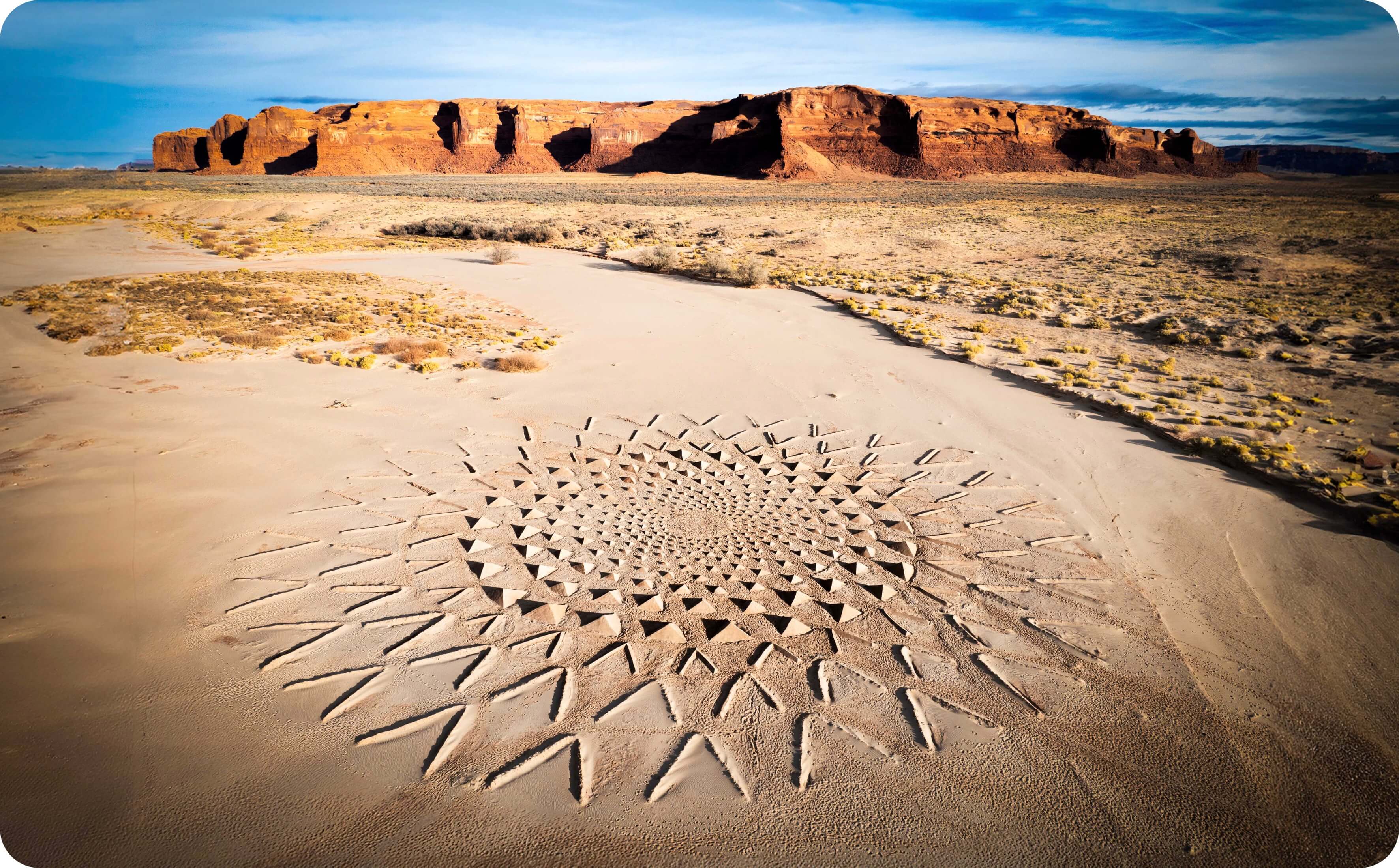 Land art the size of a football field in a riverbed designed by Owen Brown and Jim Denevan for the band A R I Z O N A