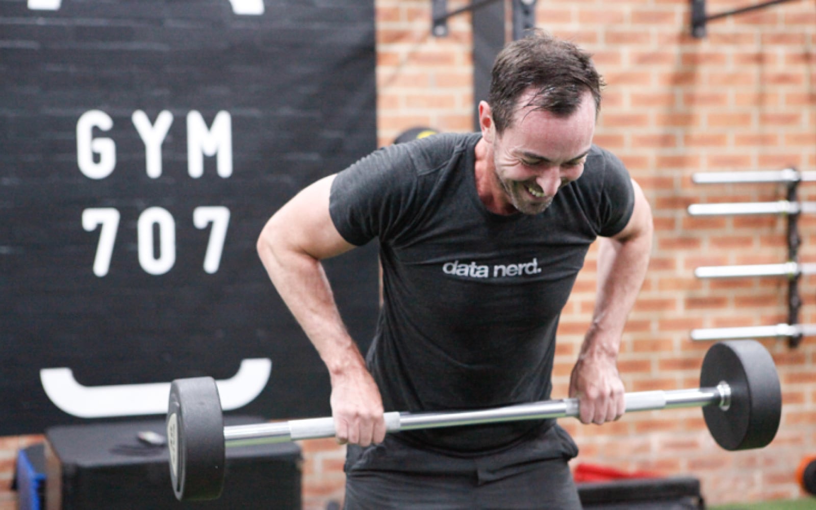 Path winding through a field of pink flowers