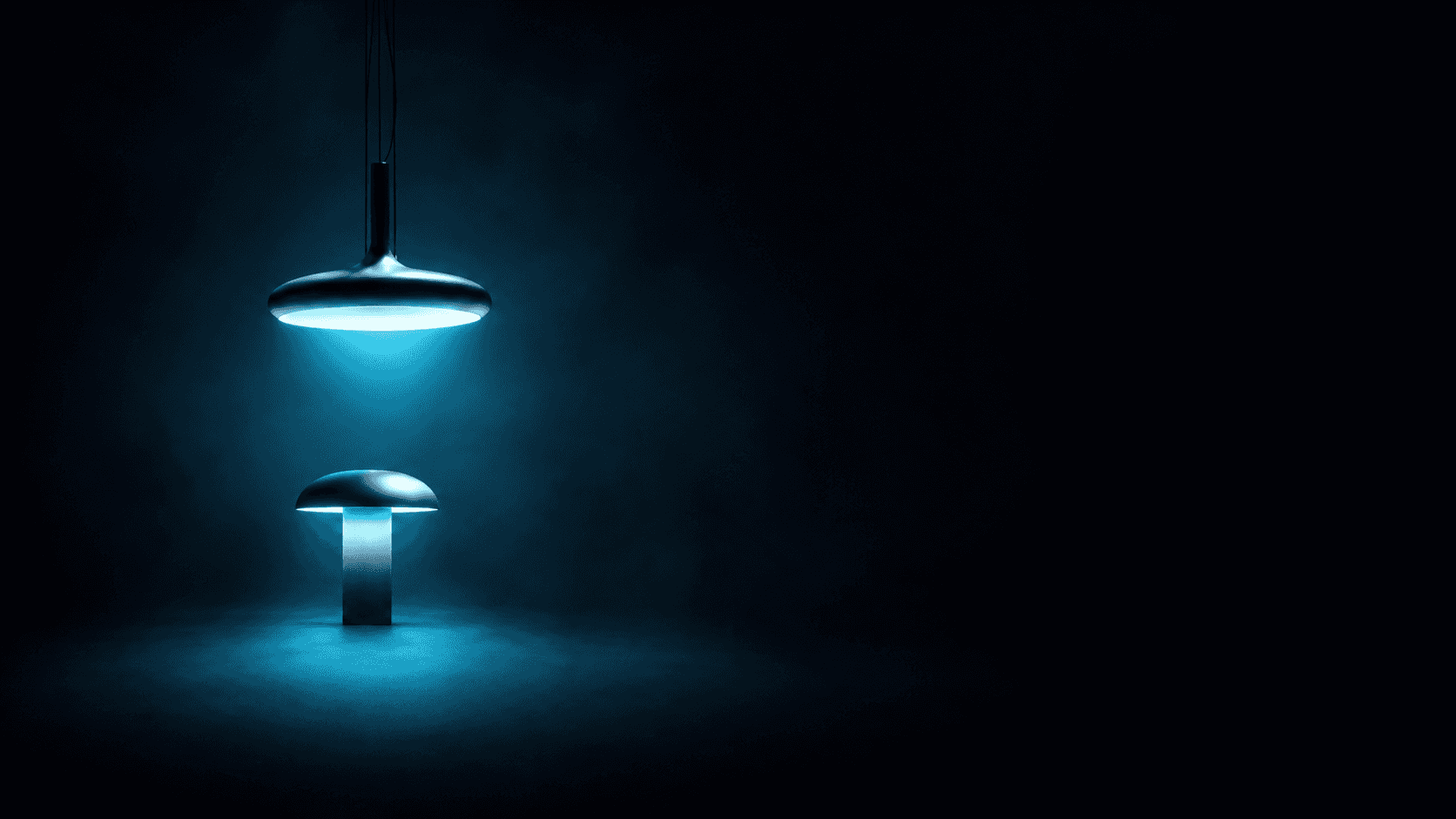 Sculptural pendant and table lamps emitting a cyan glow on a dark navy background