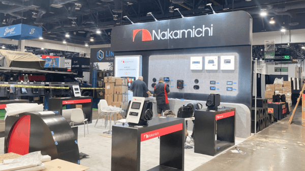 A more compact SEMA booth designed for aftermarket parts visibility, focused wall messaging, and direct buyer-facing interaction.
