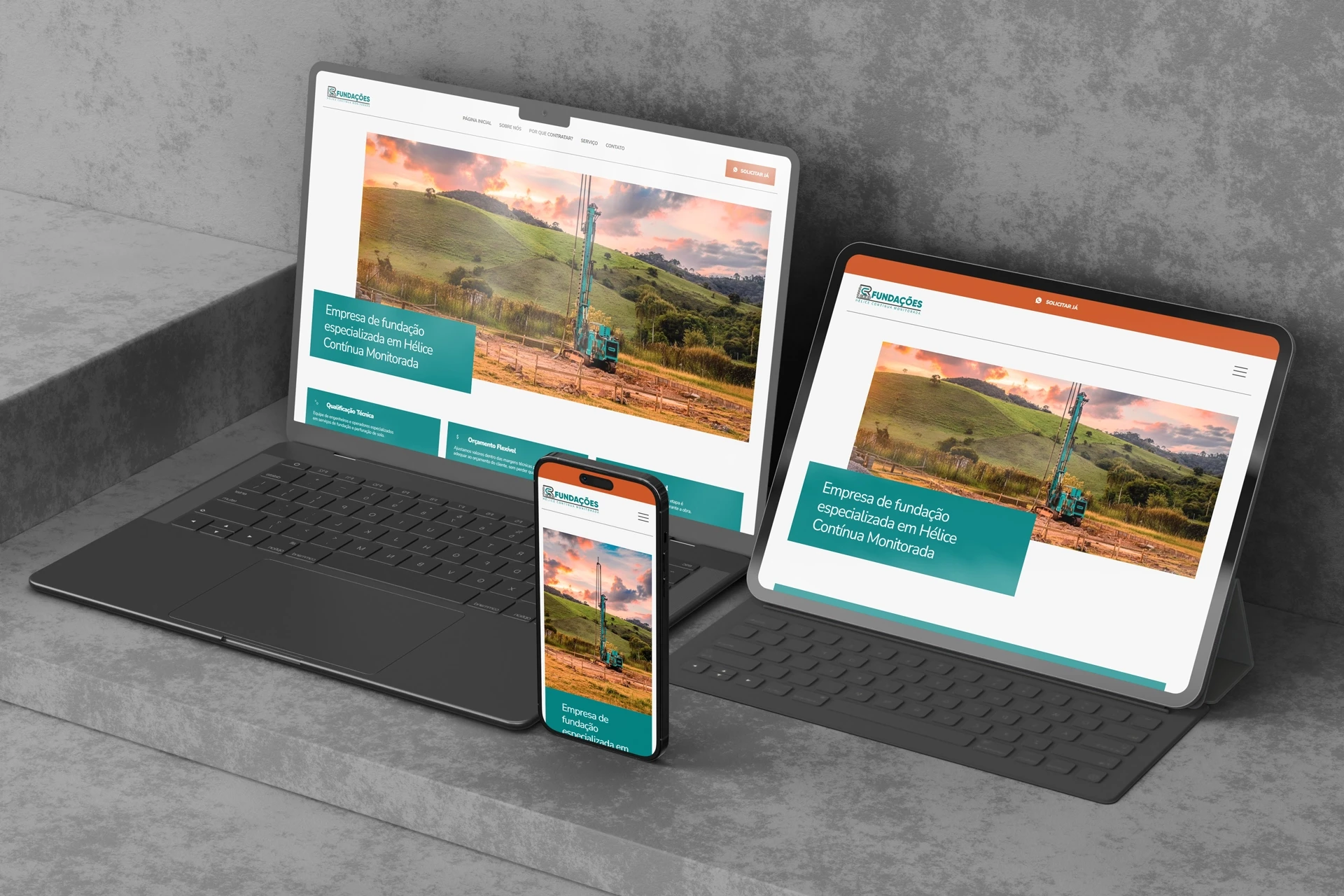 Mockup em perspectiva exibindo o site da CR Fundações em três dispositivos: notebook, tablet com teclado e smartphone. As telas mostram o design responsivo do site com banner principal de perfuratriz de hélice contínua e texto 'Empresa de fundação especializada em Hélice Contínua Monitorada'.