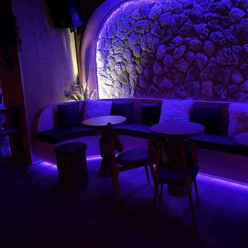 Seating area in the normally tempered bar area.