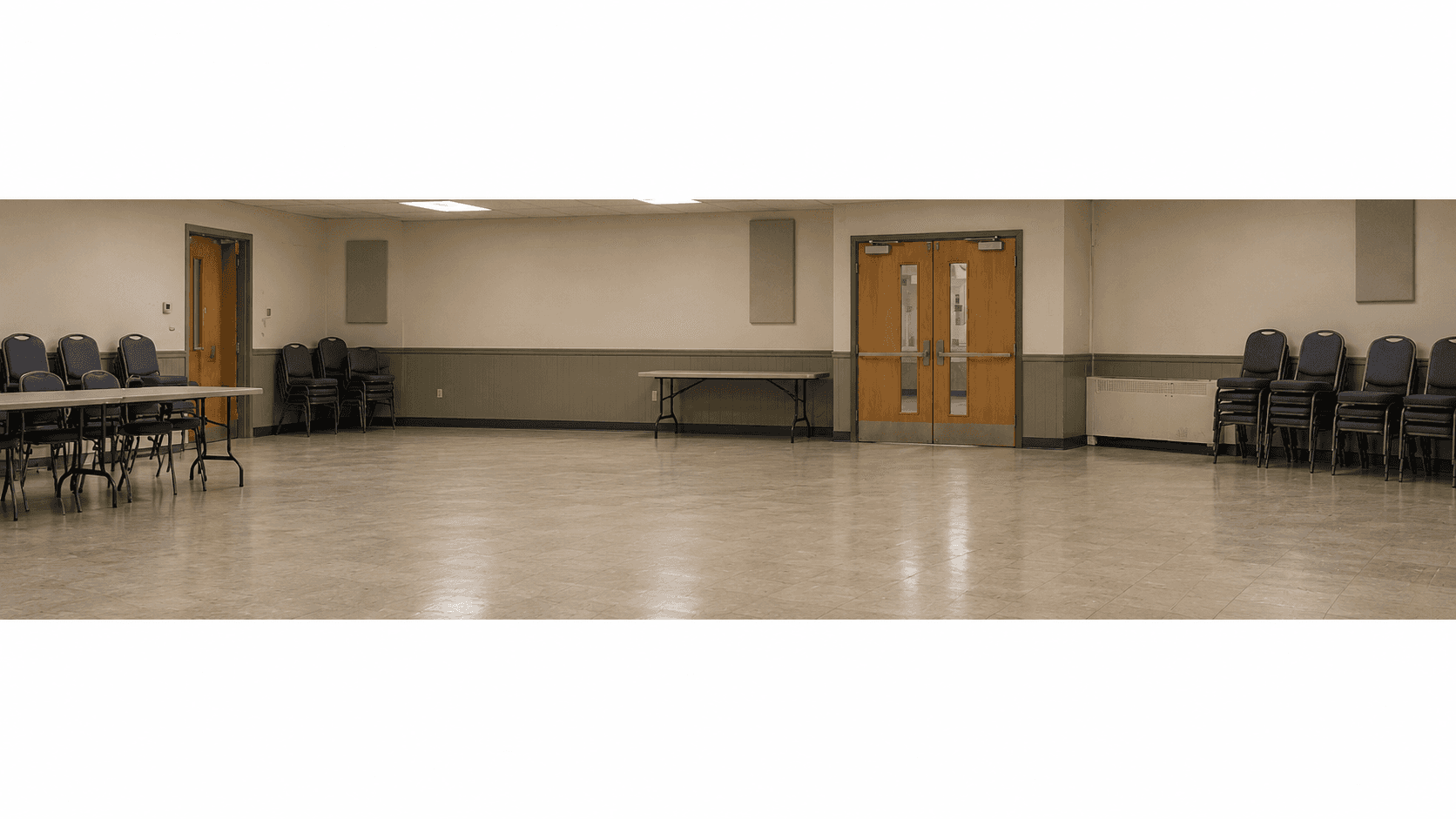 Community hall with chairs along the walls
