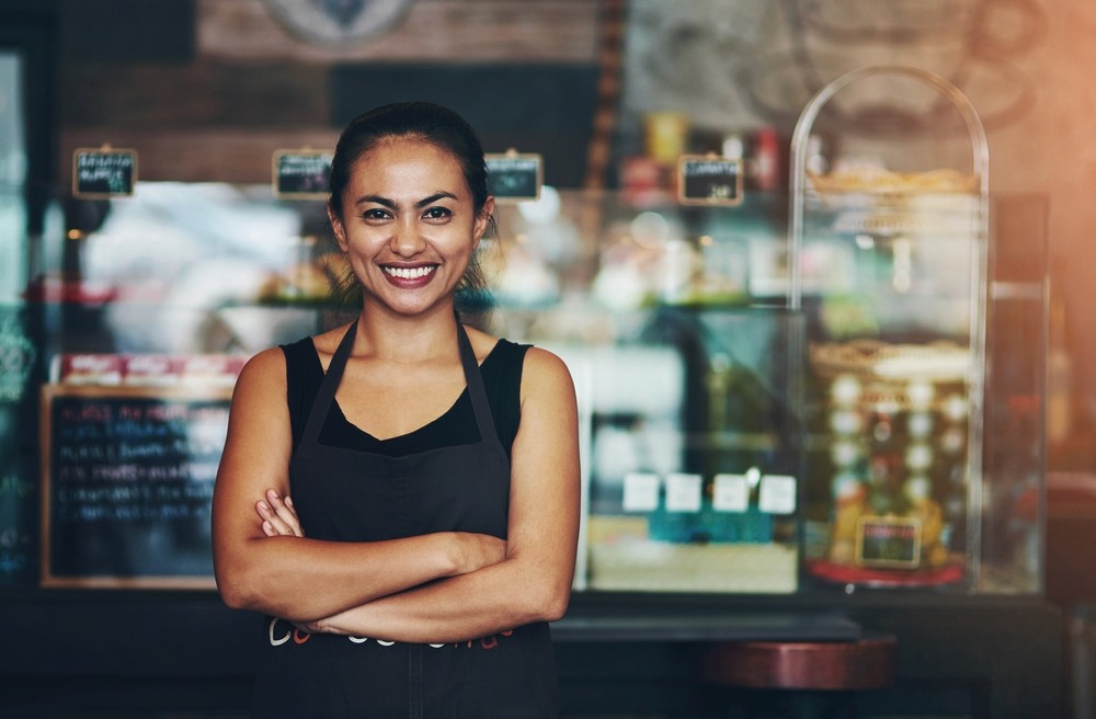 a cafe owner happy having sold her business through Sherpa