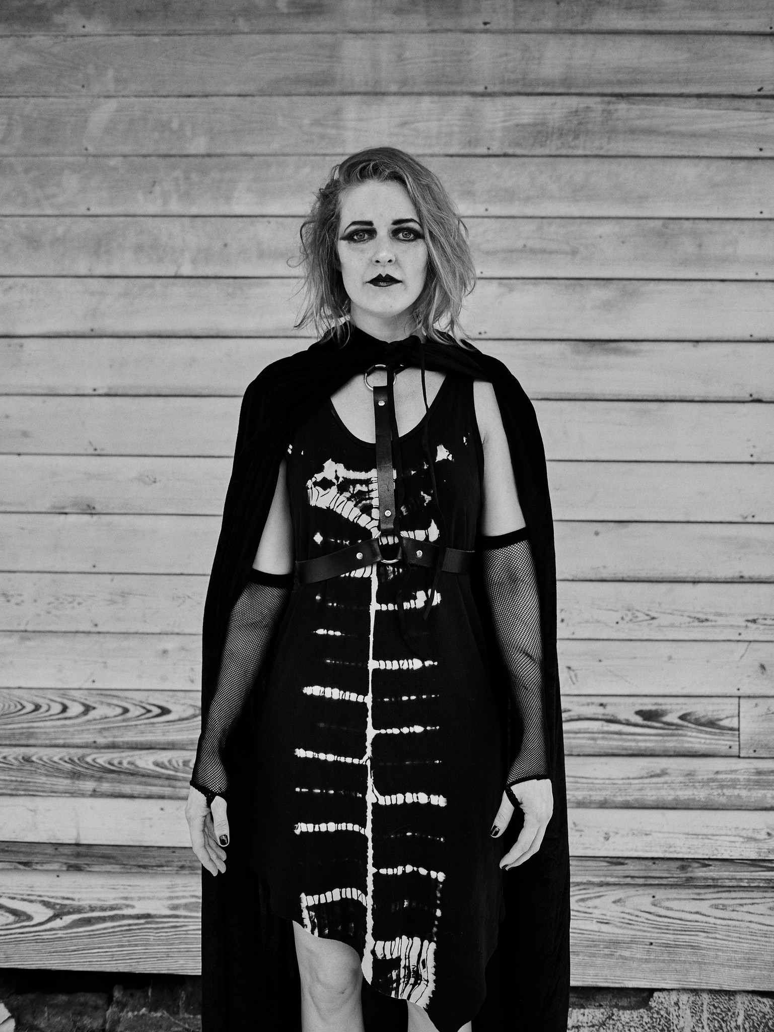 Black and white portraits of young alternative, romantic, goth, freak, punk and metal character against a textured New Orleans backdrop. 
