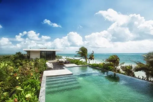 Private pool at Casa Sastran with stunning ocean and villa views.