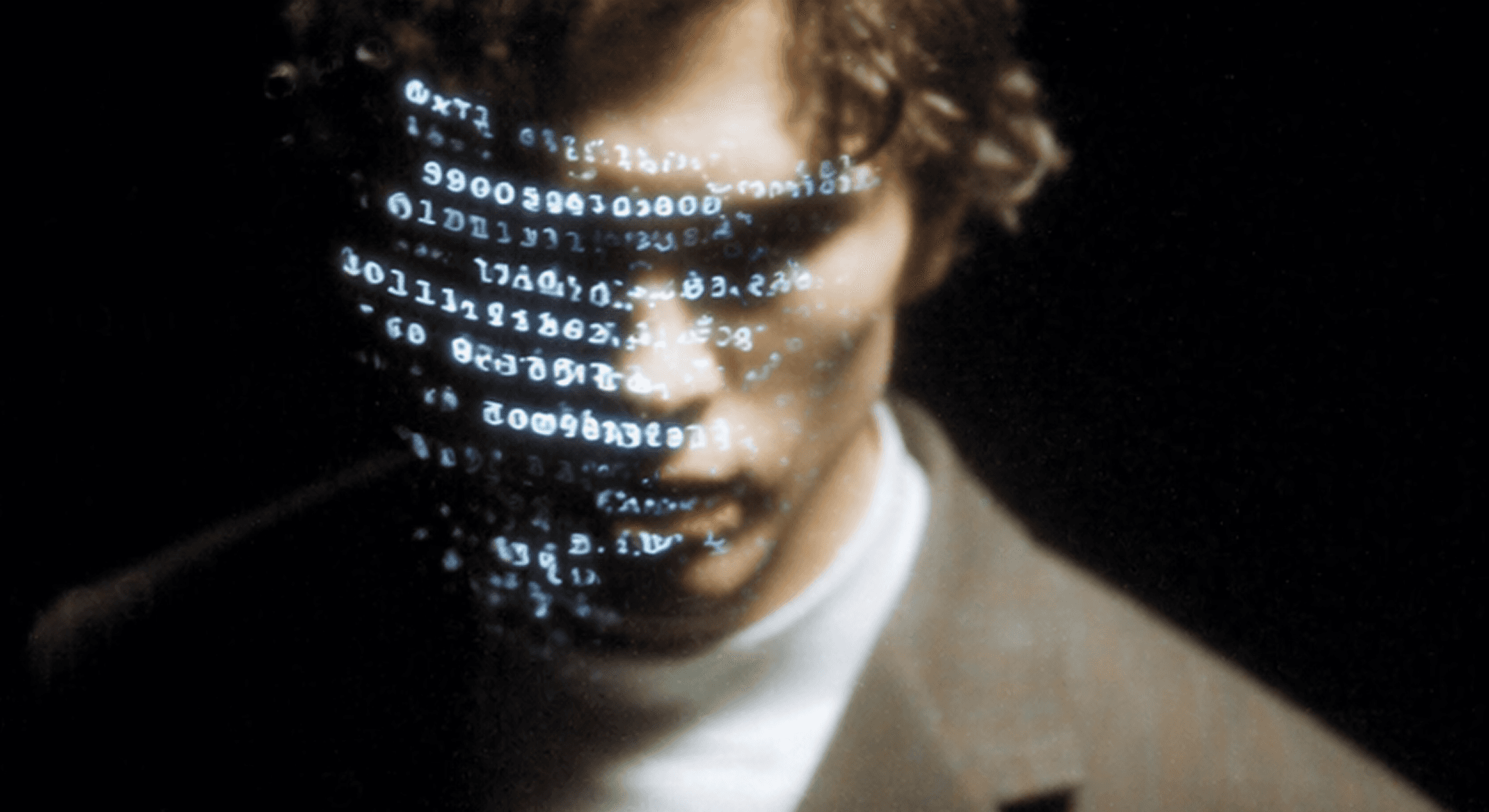 Portrait of a man with lines of code projected across his face