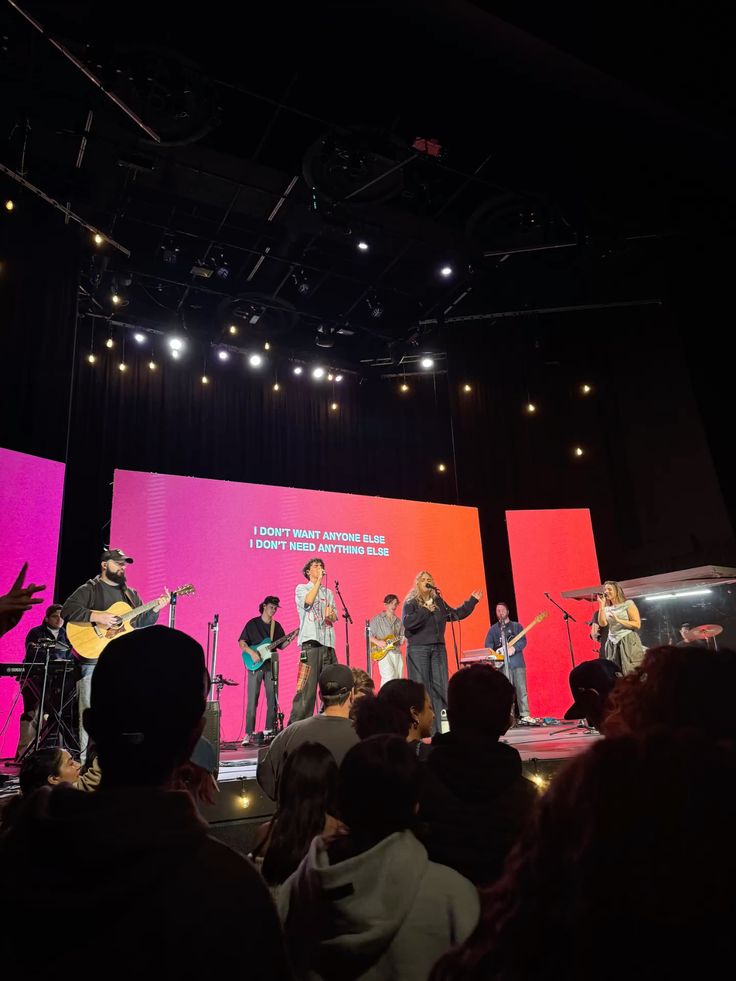 man in black and red shirt reading book