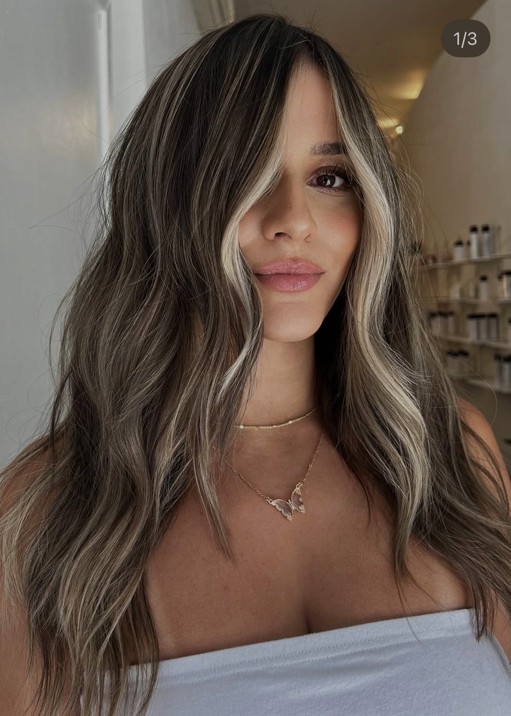 Dimensional brunette balayage with soft waves, colorist for textured hair, brunette gloss specialist