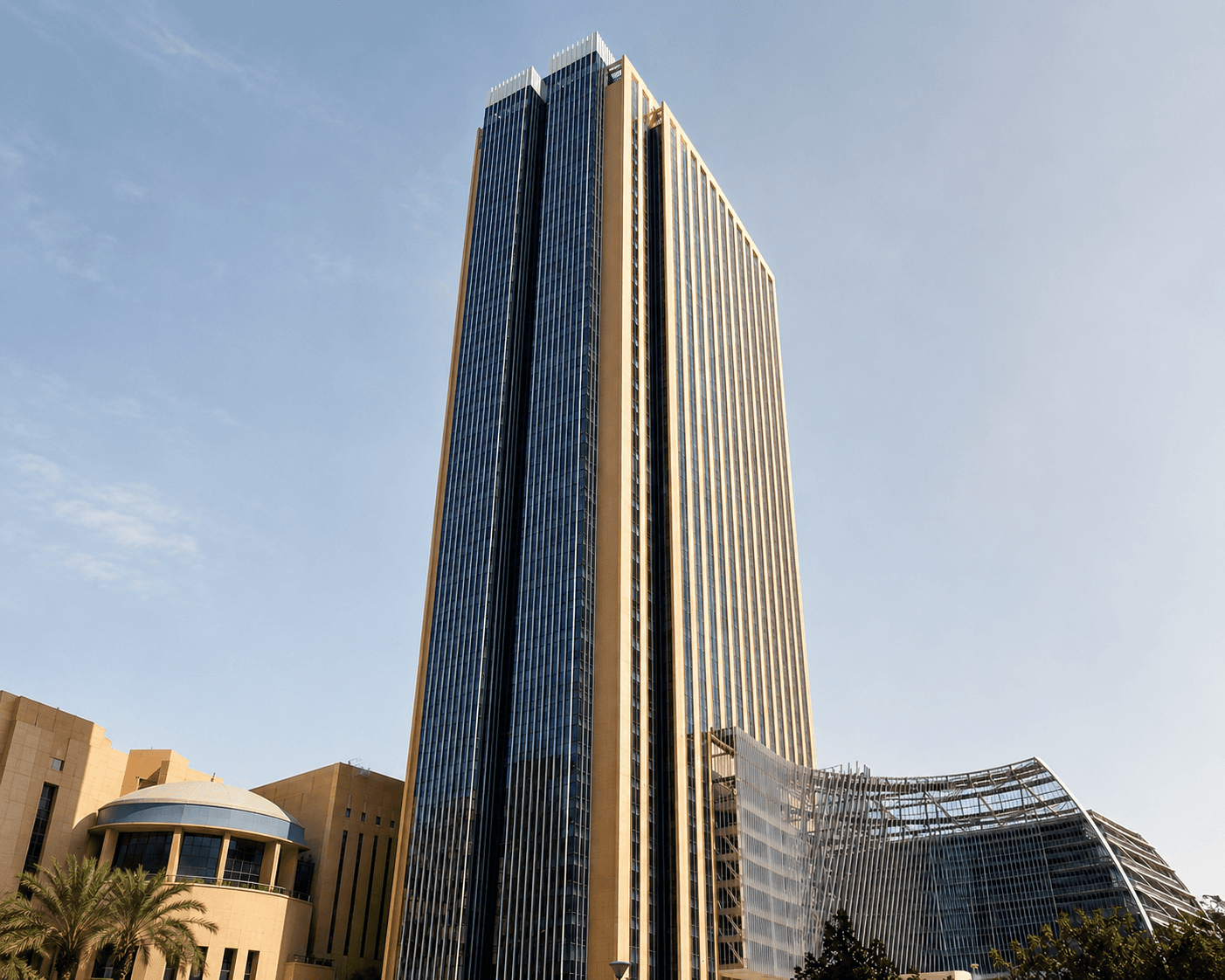 Exterior view of serviced office tower in Dubai Marina with modern skyline surroundings.