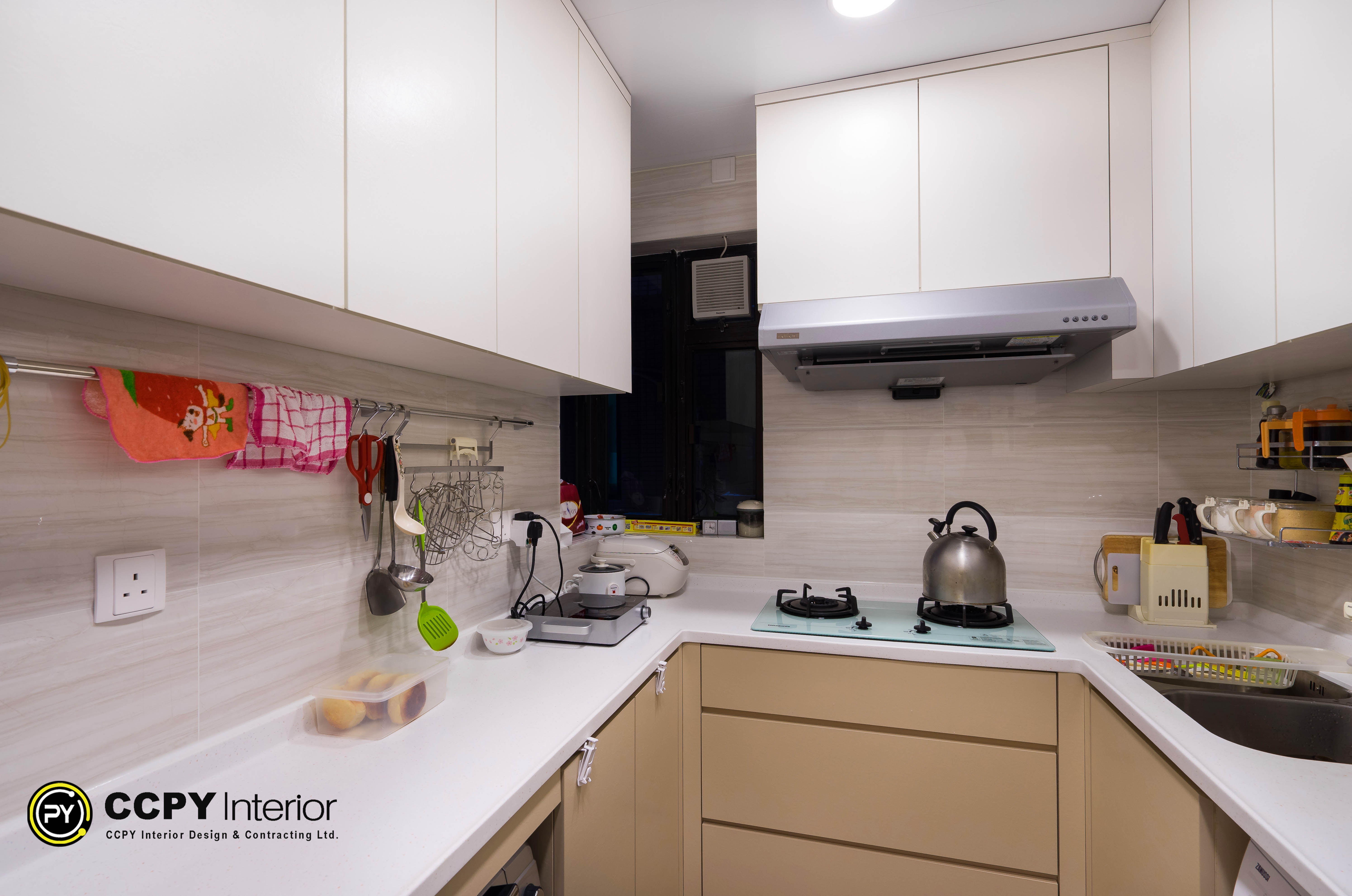 Smart storage solutions and durable materials define the house interior design of this functional Castello kitchen with integrated appliances.