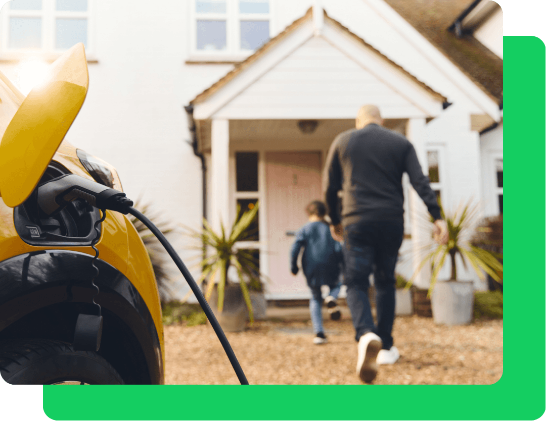 EV charger fitted to a home with family in the picture 