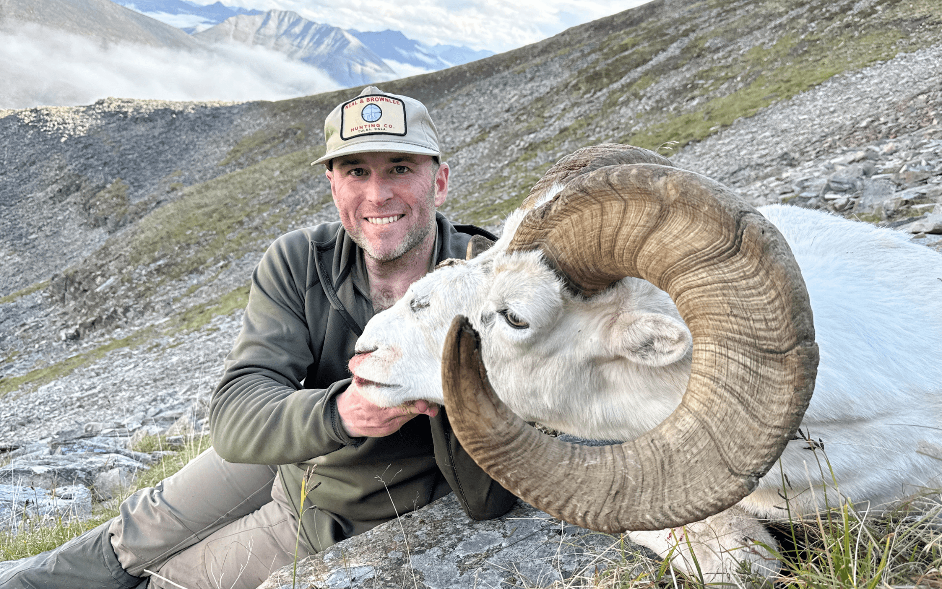 hunter with a 14 year old Dall ram in the Northwest Territories