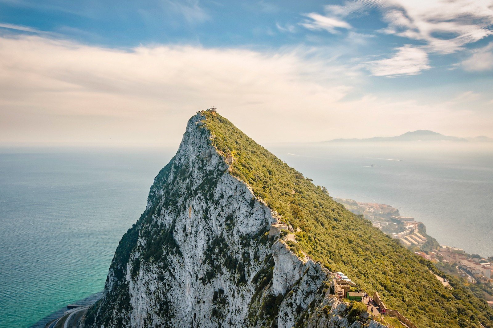 The Rock of Gibraltar overlooking the Mediterranean Sea, symbolising stability, endurance, and long-term trust planning for family wealth across generations