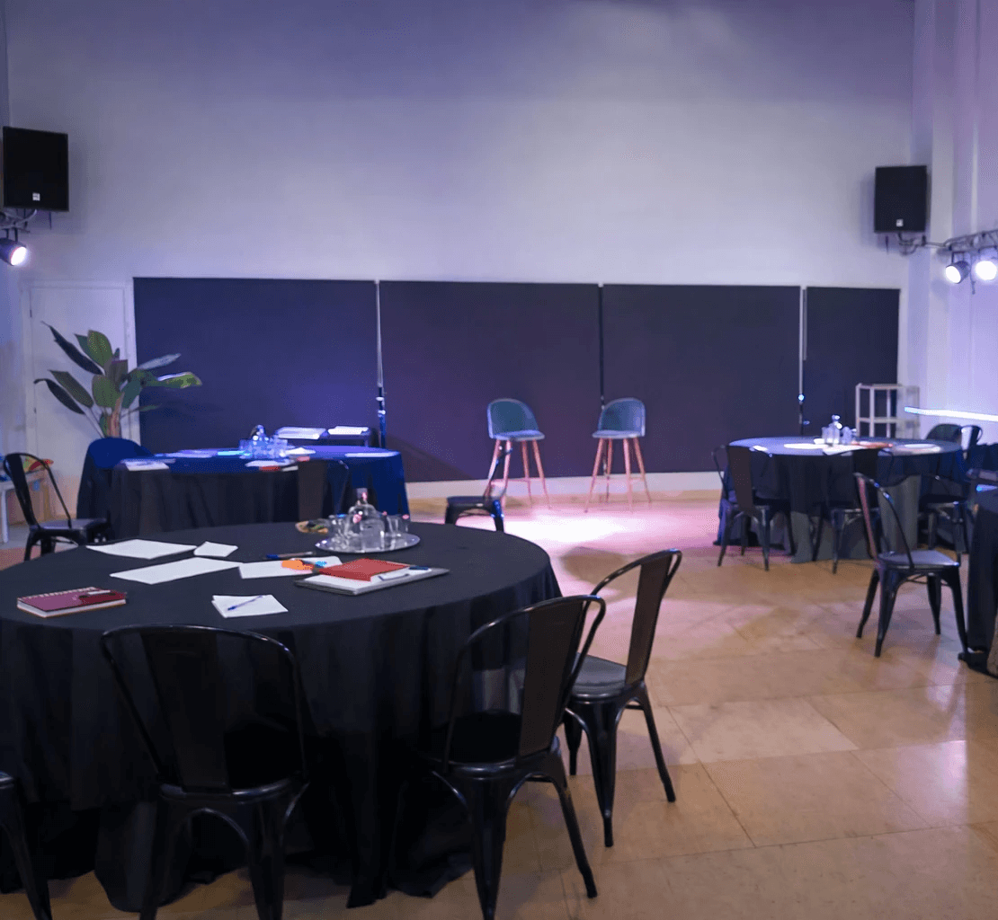 The wedding backdrop is the open sea, shimmering under late afternoon light