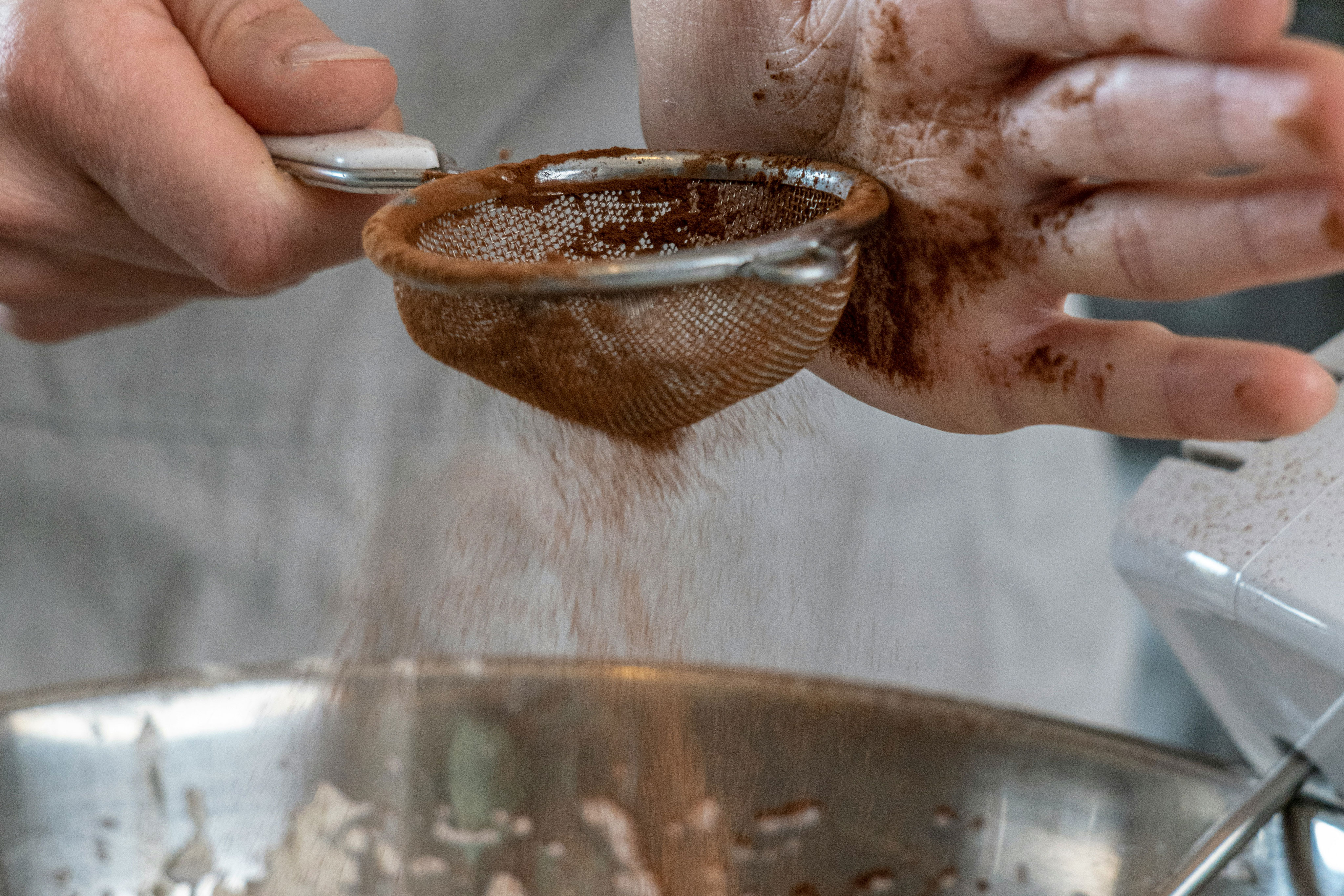 brown liquid in white ceramic mug