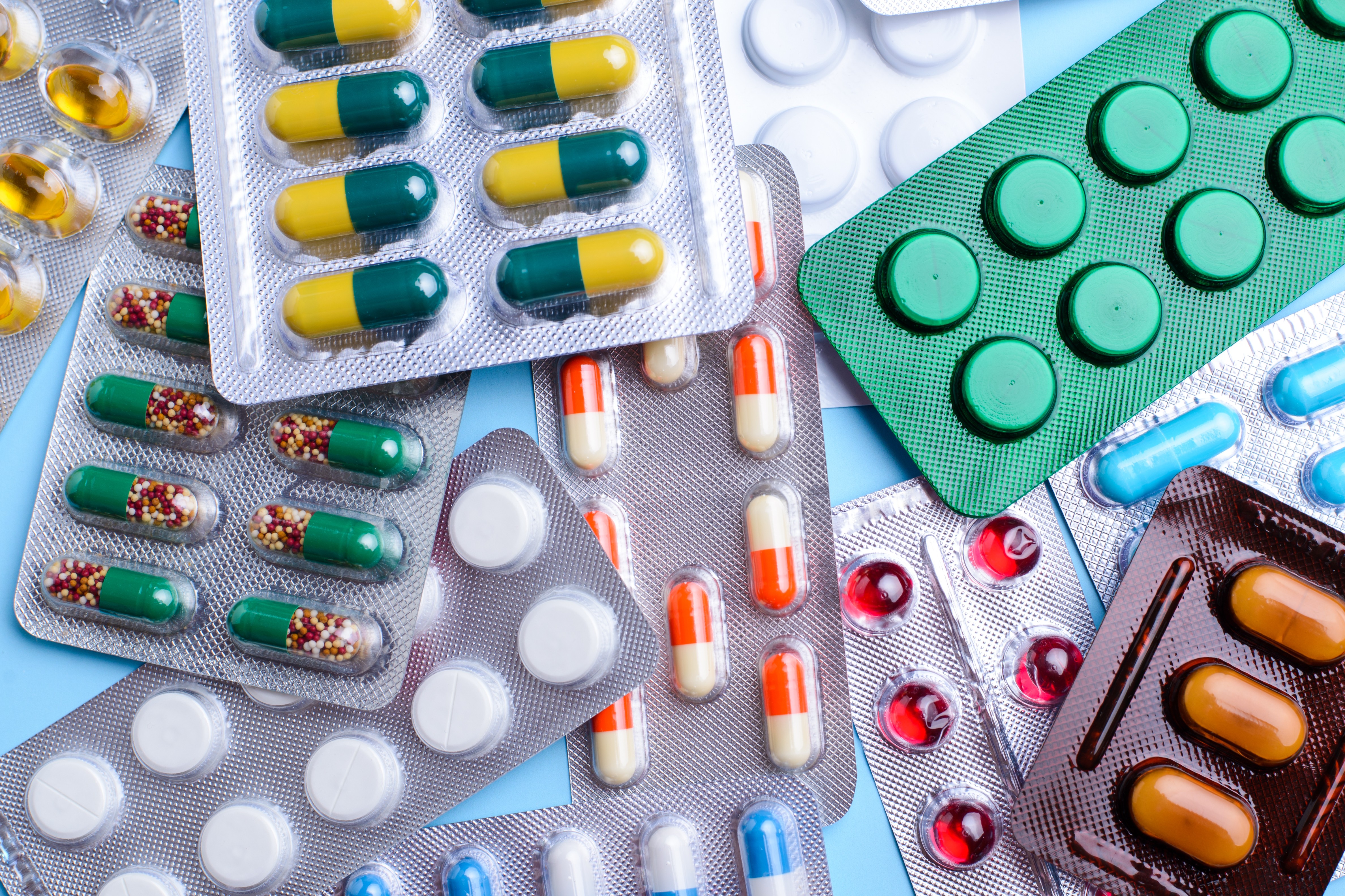 A variety of blister pack medication on a table