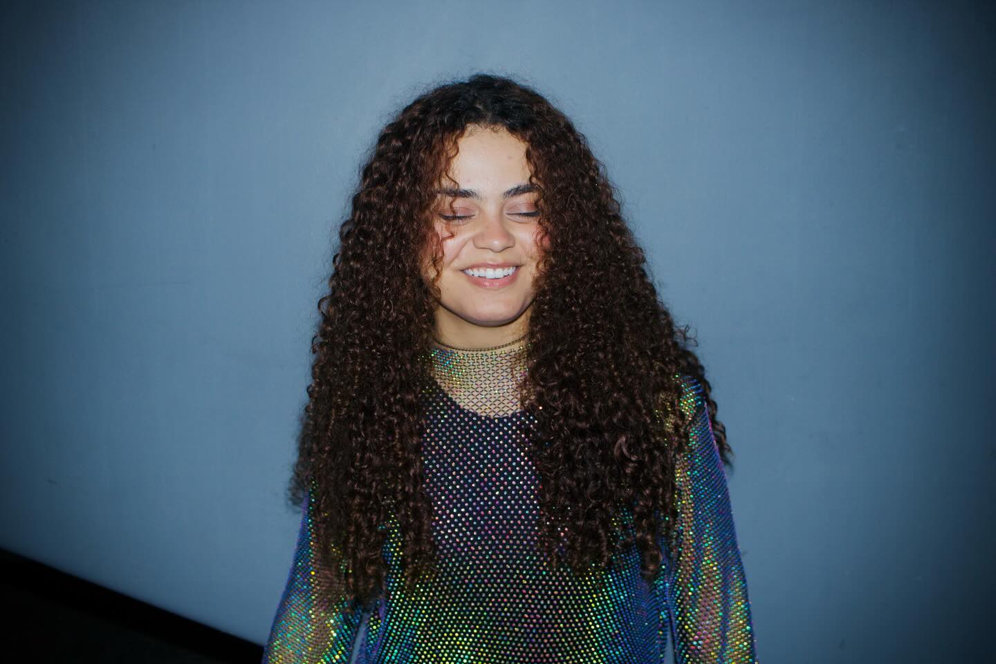 Image of a rapper with headphones