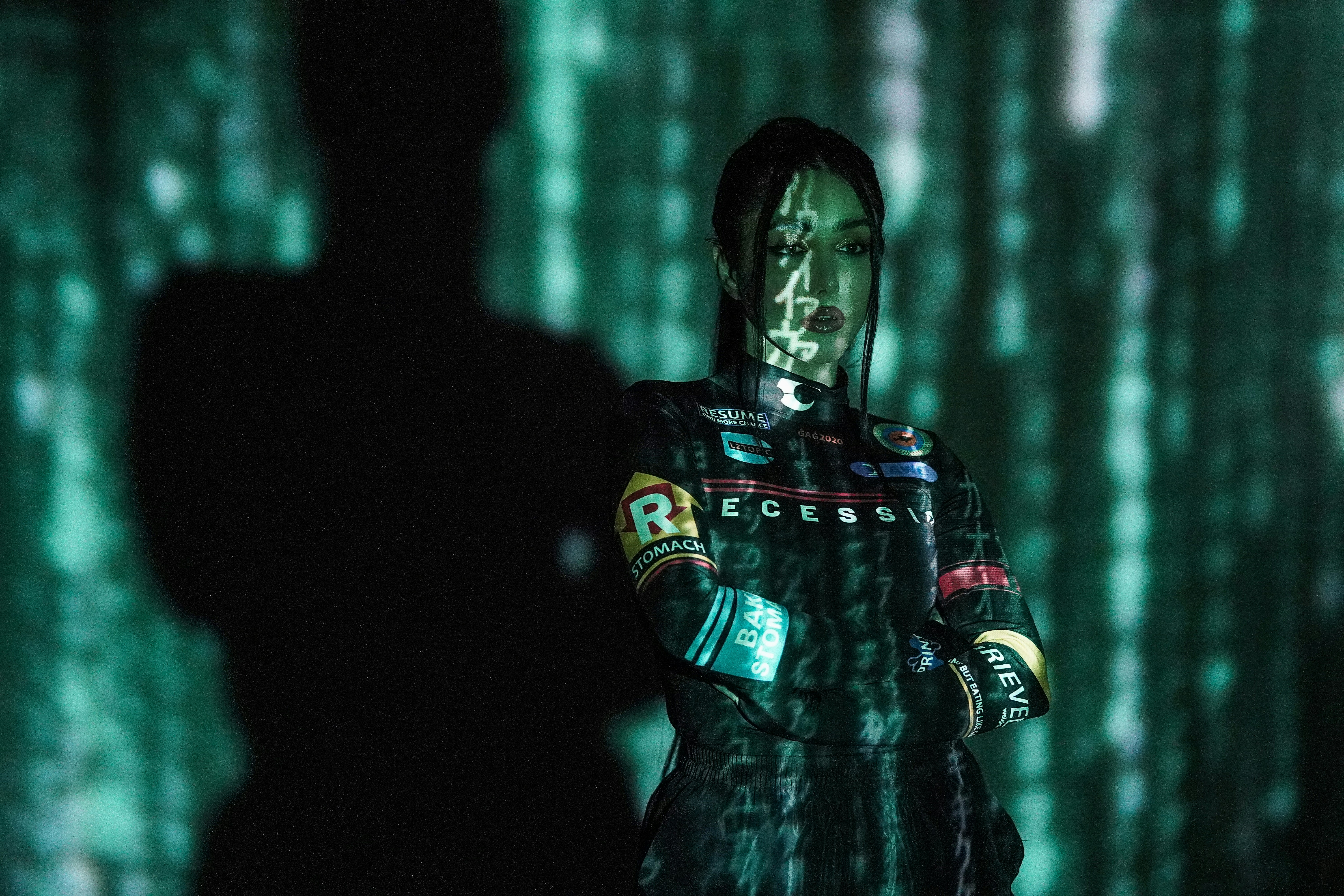 a man standing in front of a green screen