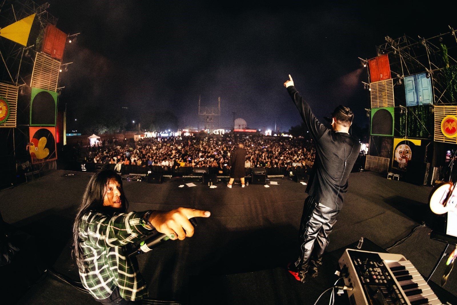 Wide-angle shot of a live concert in India showcasing professional videography equipment essentials for event coverage.