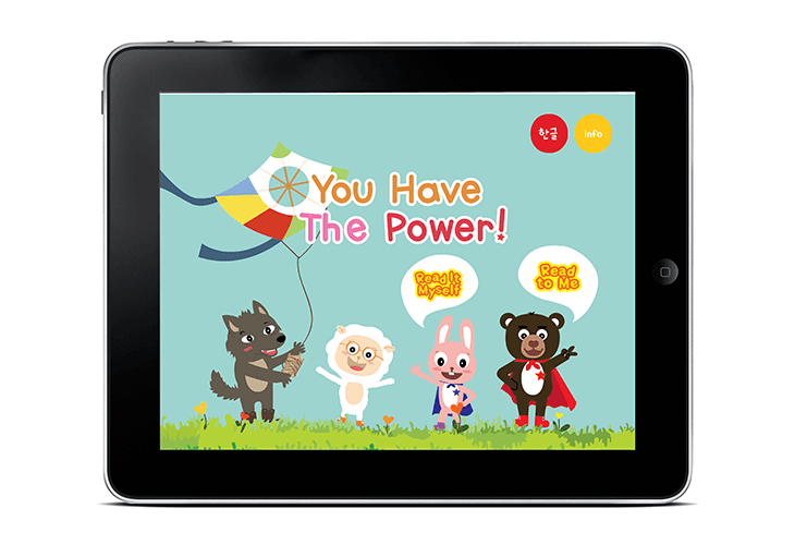 A tablet displays a cartoon graphic with the text “You Have The Power!” in multicolored letters. Below the text are four cartoon characters: a wolf holding a kite, a sheep, a rabbit wearing a cape, and a bear in a superhero costume. Each character has a speech bubble containing the phrase “Read It Myself” or “Read To Me.” The background is light blue, and the characters stand on green grass. The tablet’s screen is black, and the word “info” is visible in the top right corner.