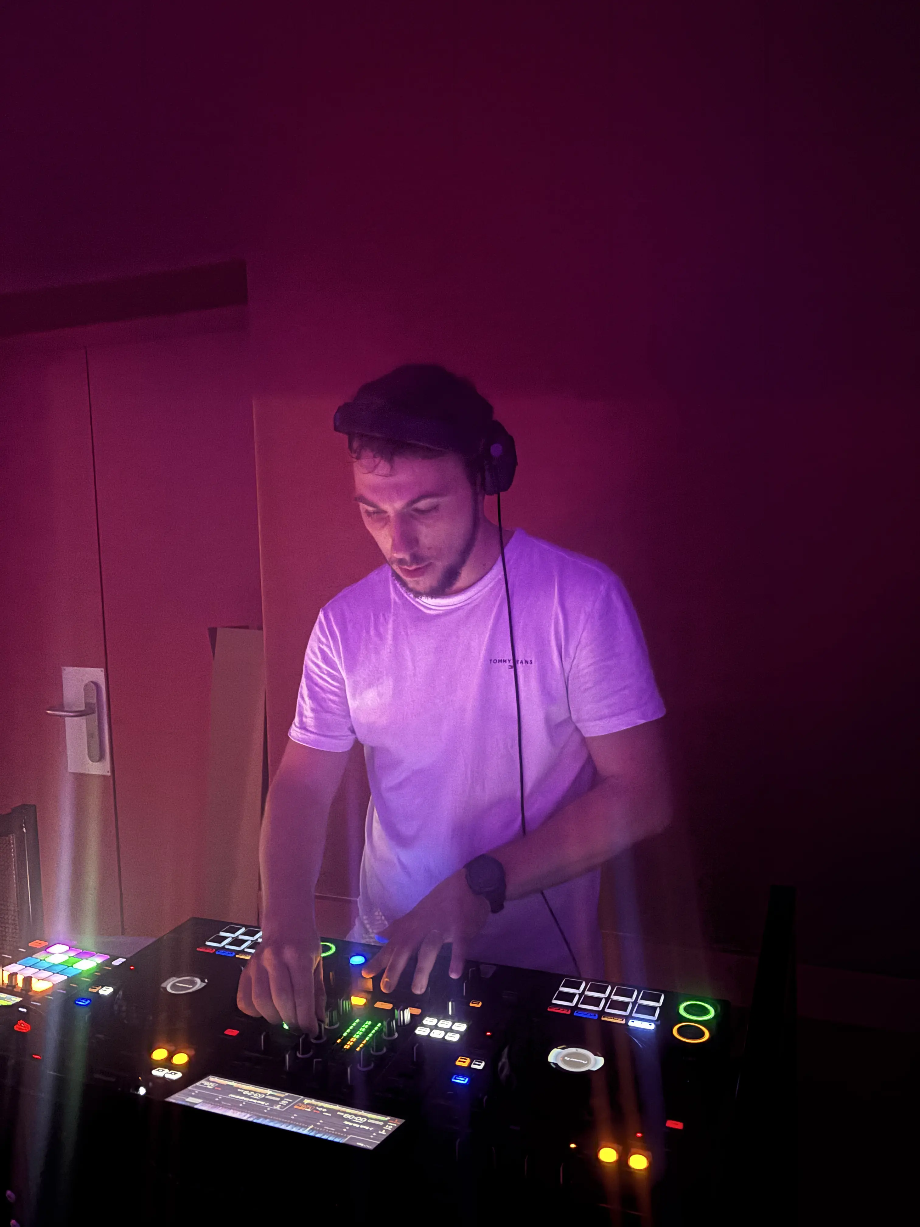 Music producer sitting in his studio