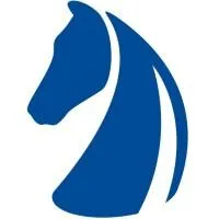 A young woman with long brown hair smiles warmly against a green background, dressed in a black jacket and white shirt.