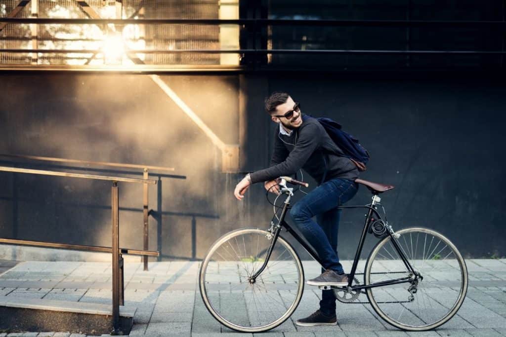 Extreme Frugality - Man riding a bike to work