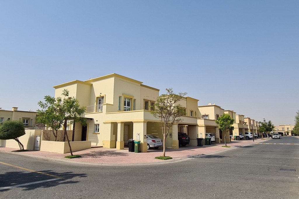 Residential houses lined up in the Springs 11 area, showcasing a typical neighborhood layout.