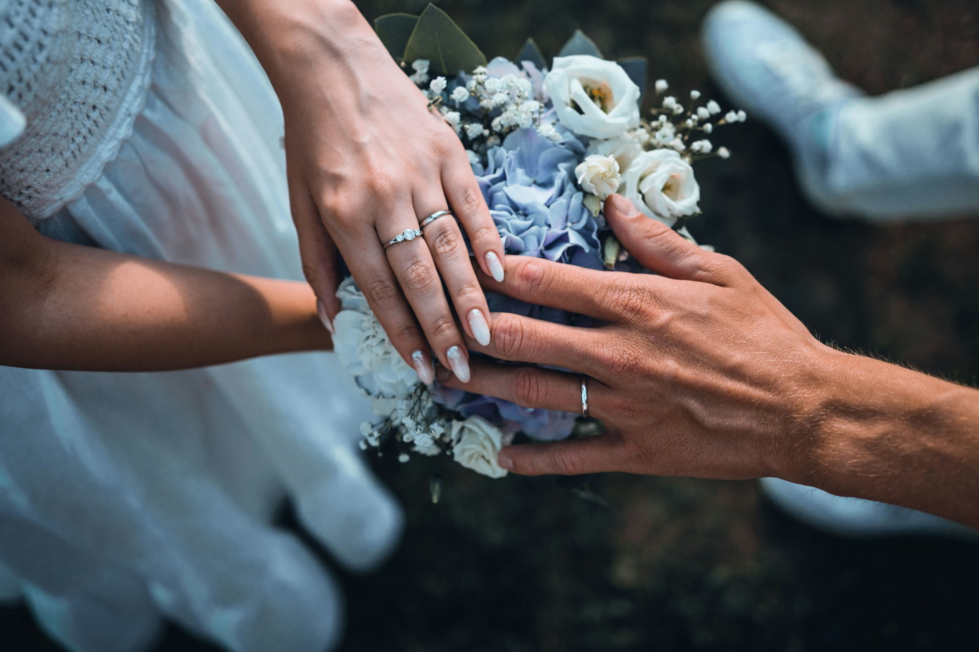 bride and groom hands