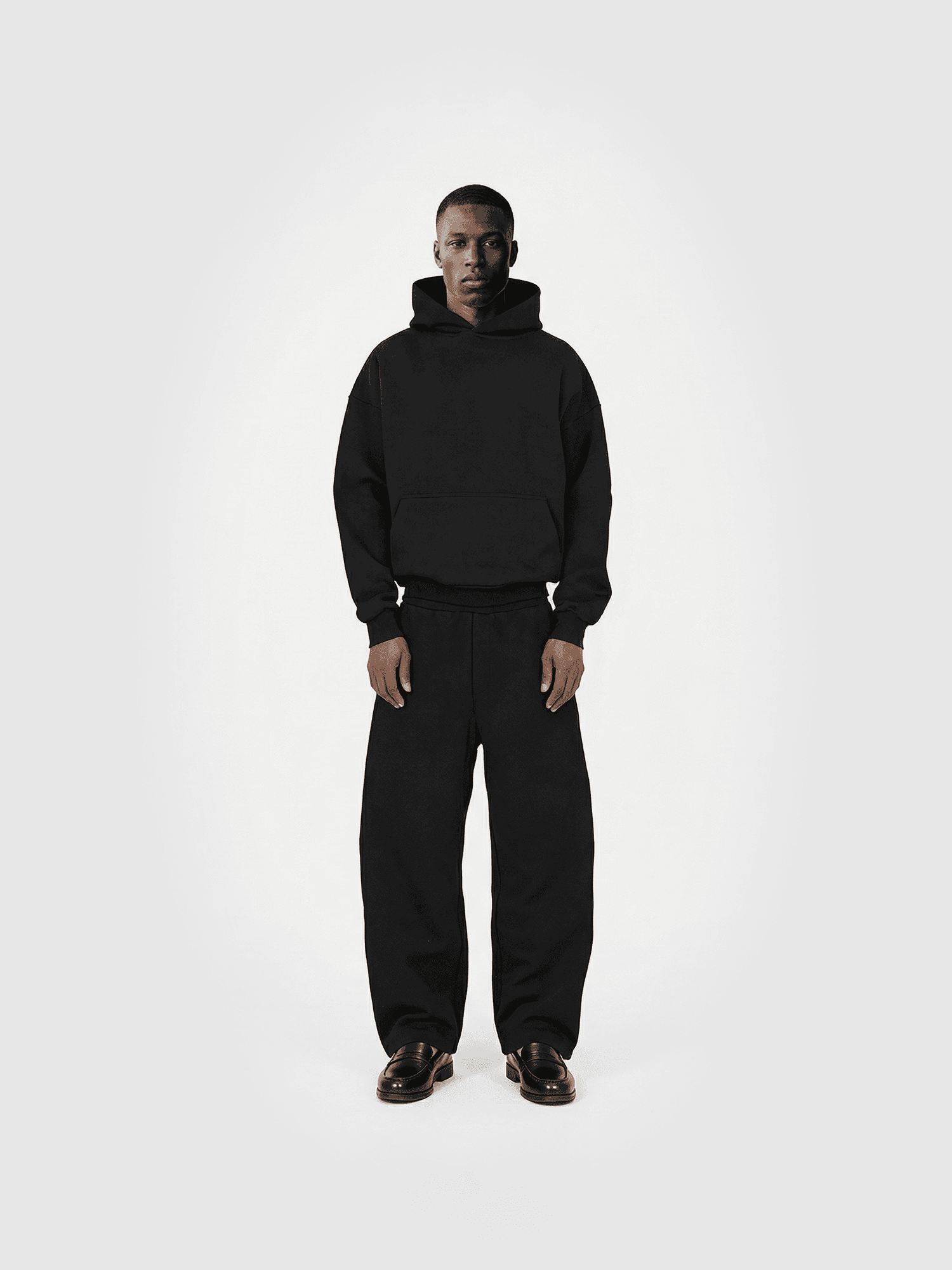 Heavyweight classic crew T-shirt in black — front view on model.