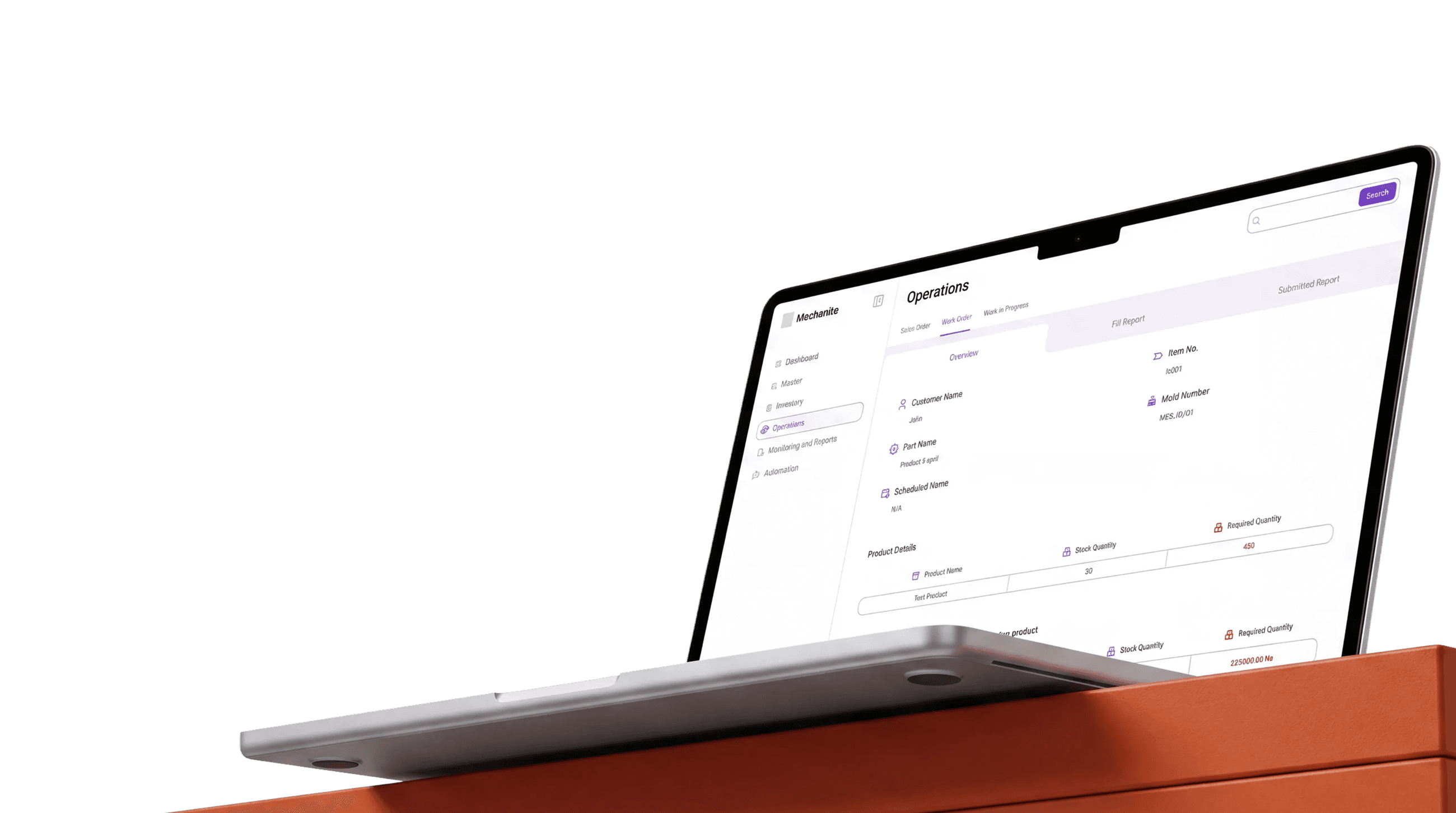 A laptop on an ember-orange desk showing the Mechanite operations dashboard