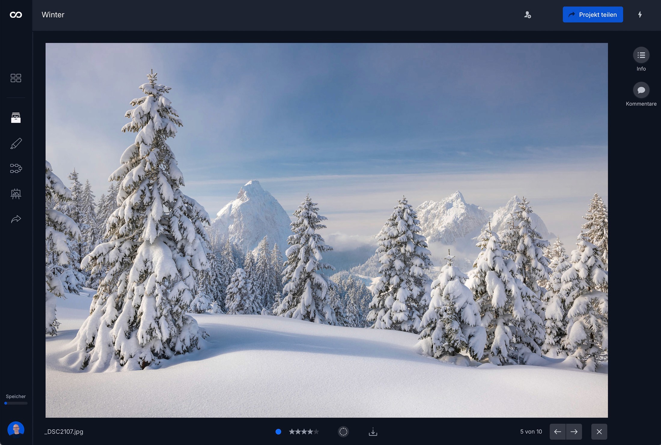 moodcase screenshot with A serene winter landscape featuring snow-covered trees and mountains under a clear blue sky.