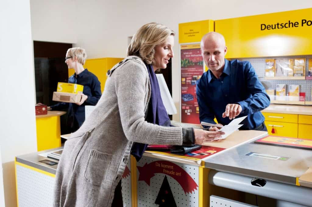 A customer collecting an undeliverable parcel at a service point