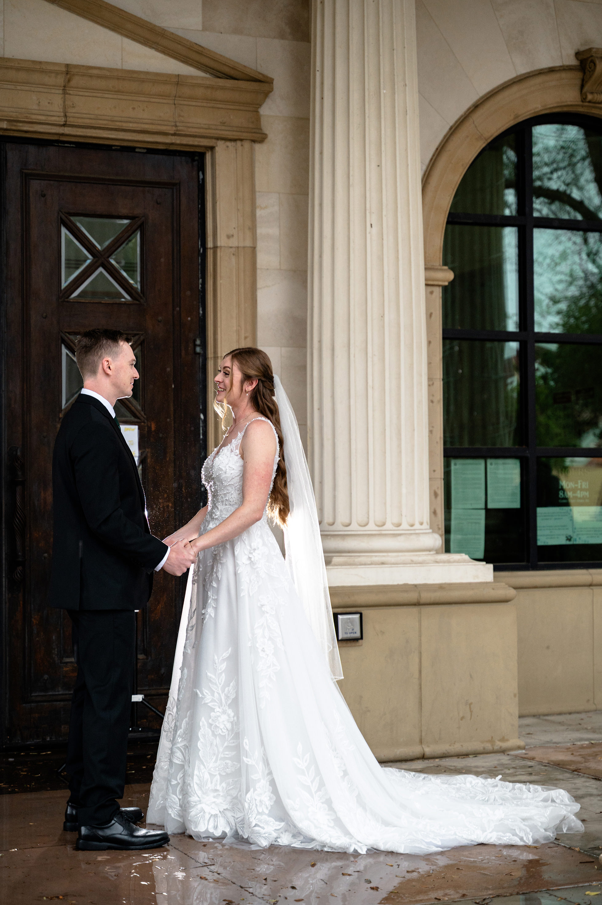 Flat lay wedding details with bouquet, rings, and sparkling bridal heels