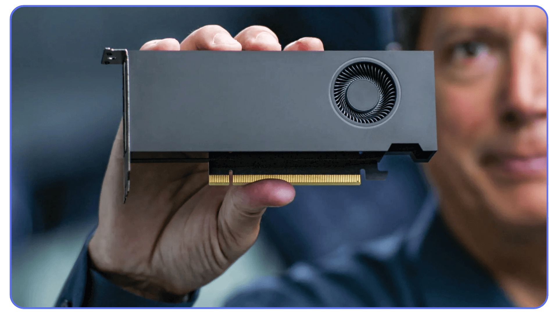 Professional holding a workstation-class GPU with a blower-style cooler, representing certified graphics options for CAD reliability.