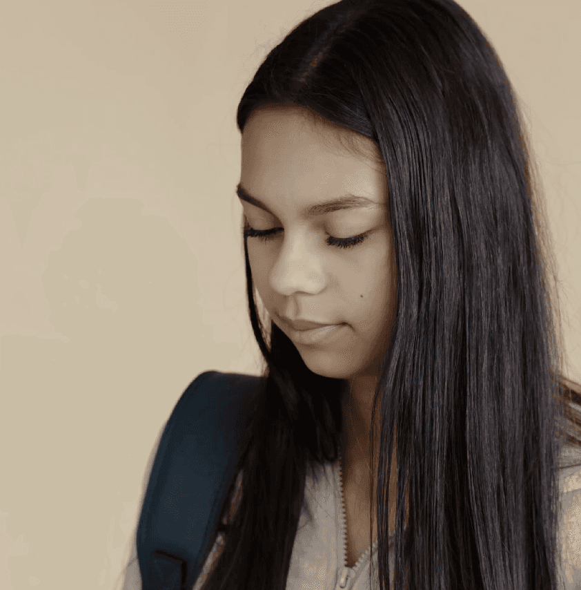 woman holding heft long blonde hair