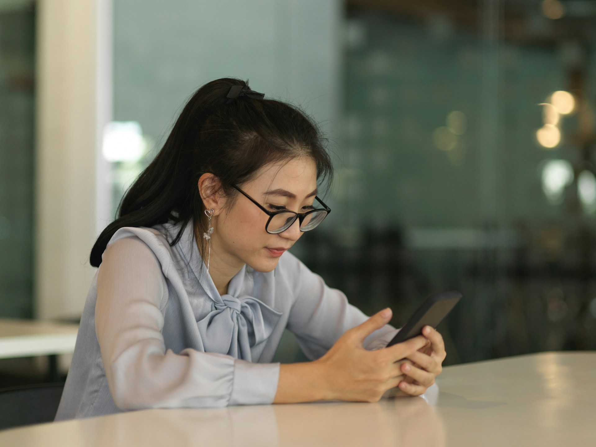 A woman using her phone