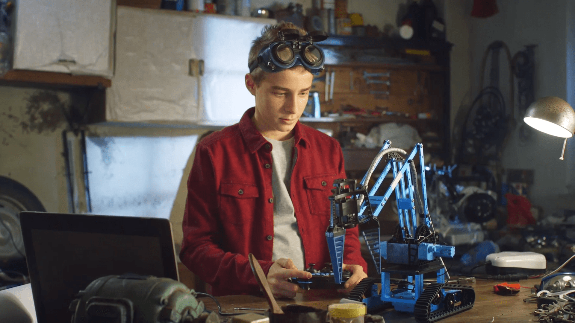 woman in red and white hoodie wearing black headphones