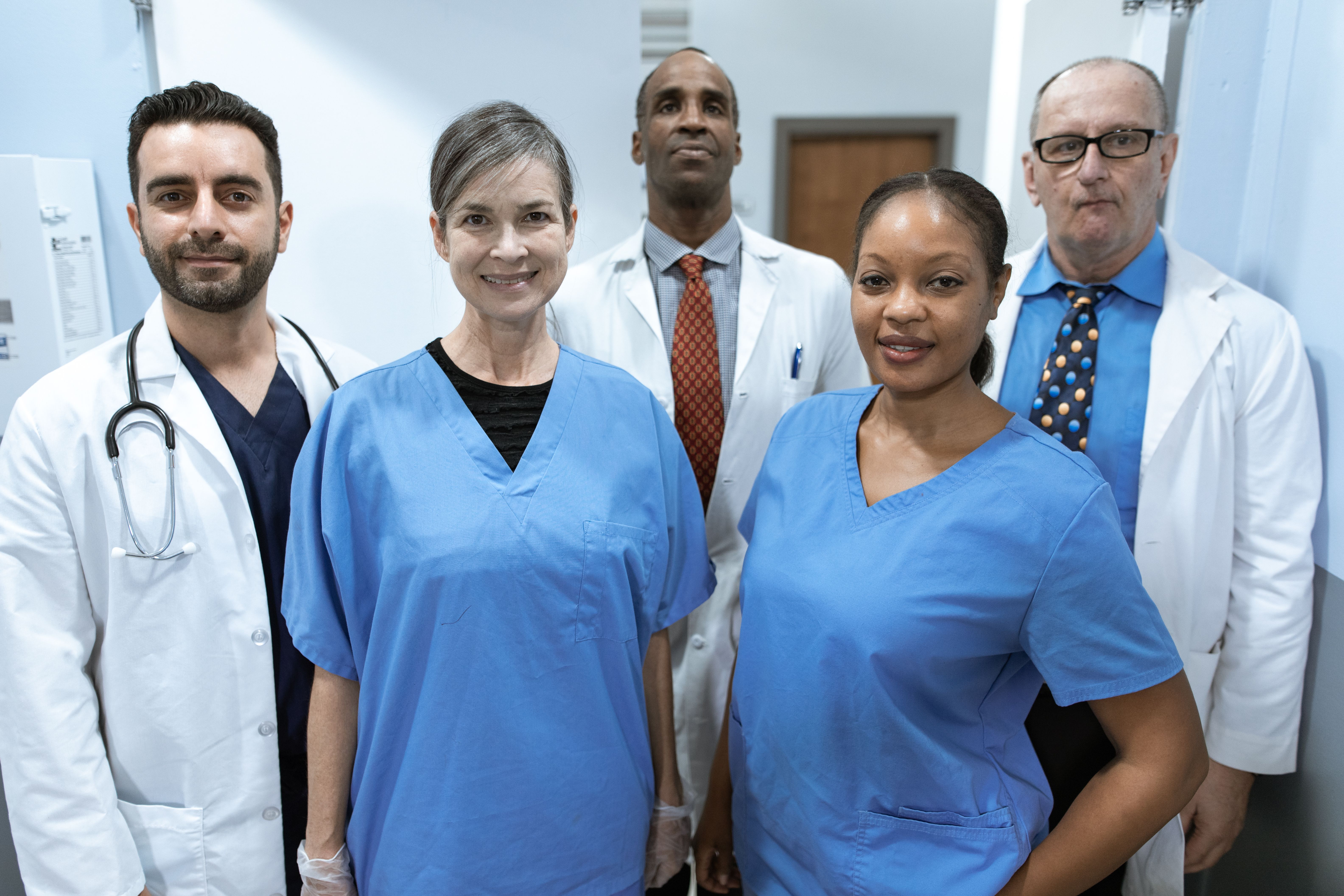 A group of people in a dental room