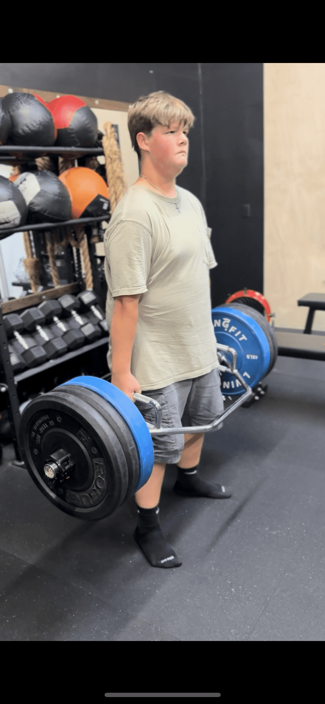 Baseball player deadlifting