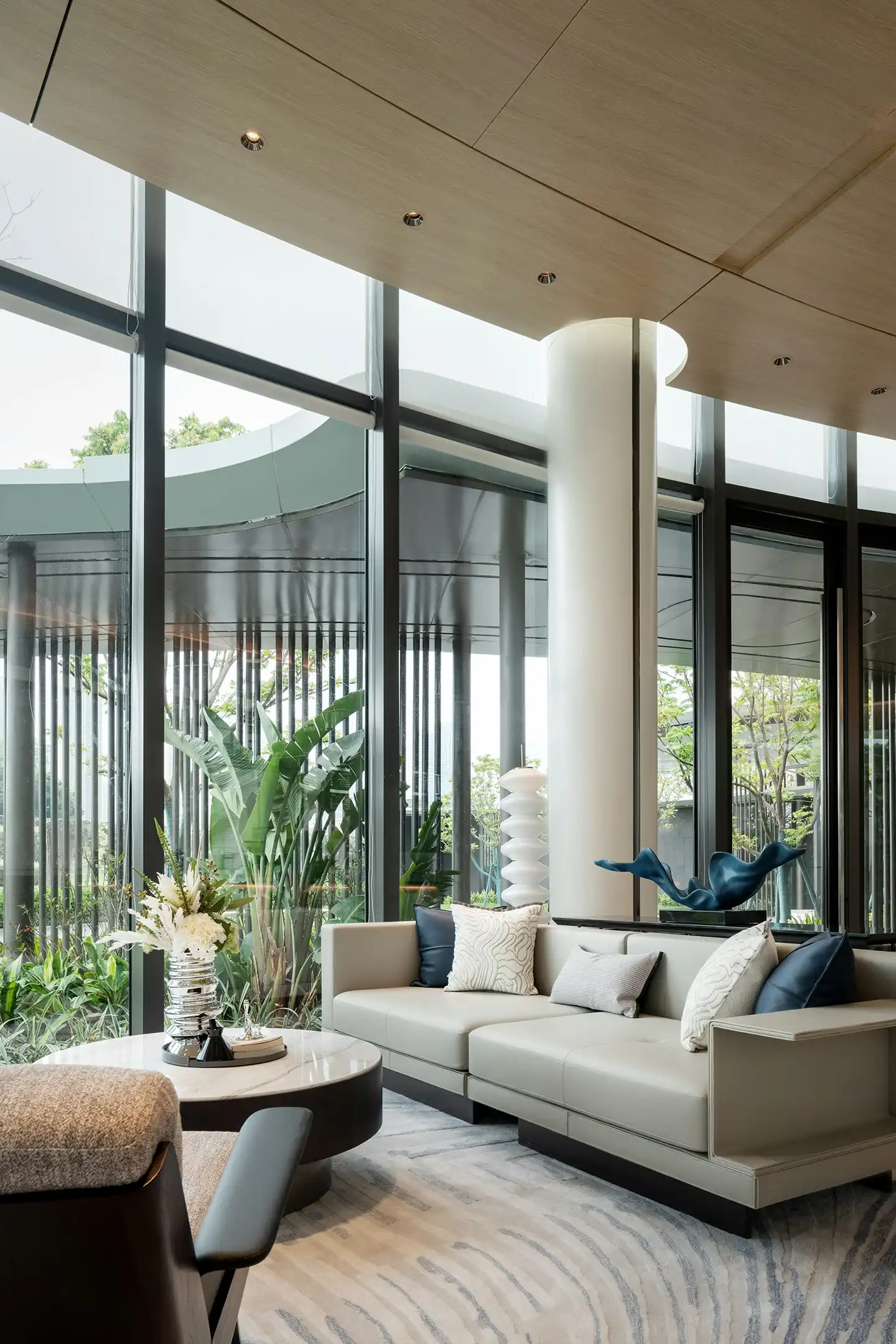 Comfortable living room with sofa, coffee table, and soft lighting