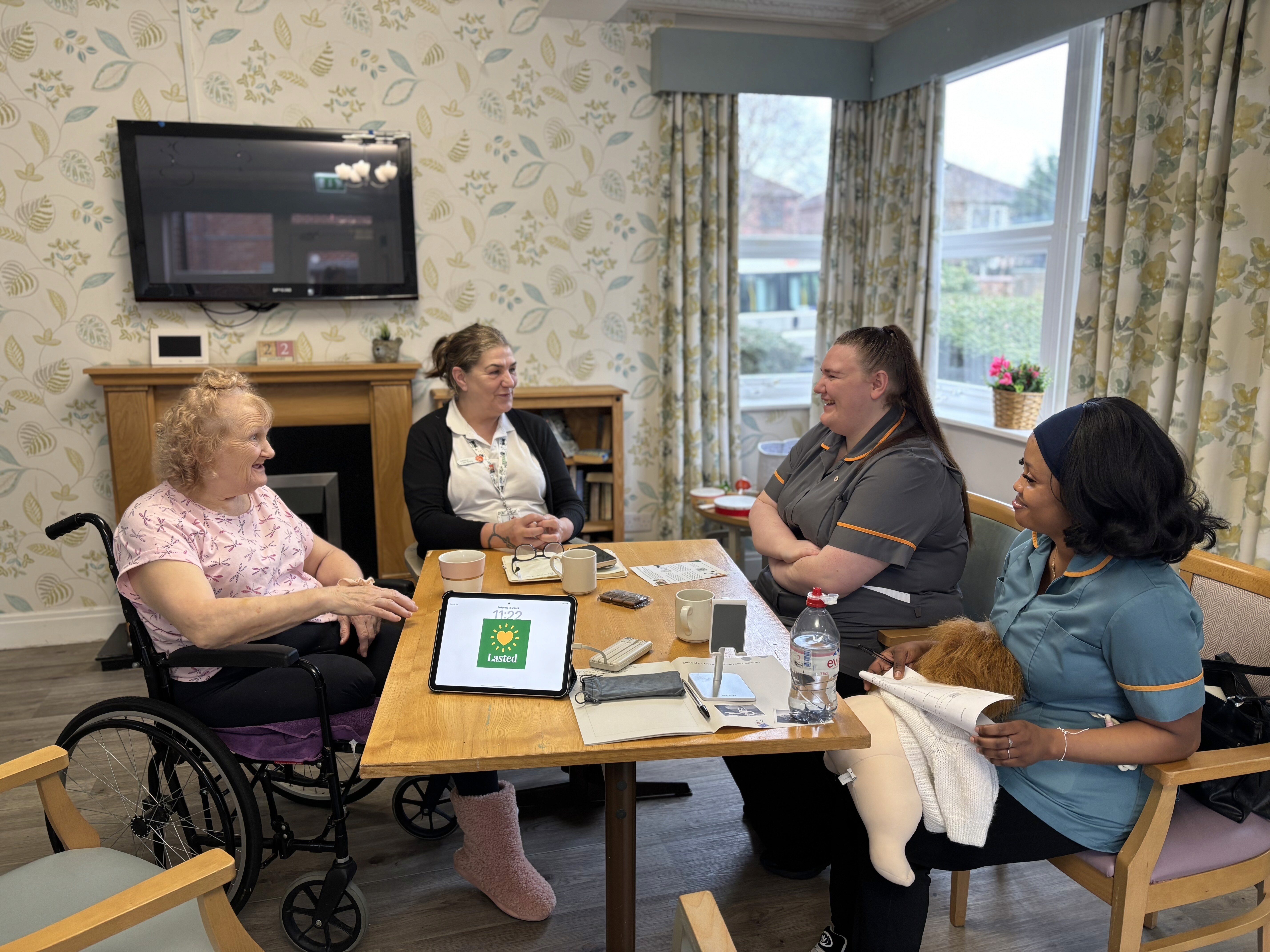 woman kiss a baby while taking picture