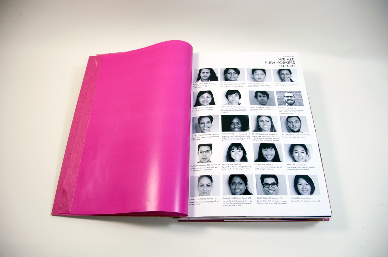 an opened book with a blank pink page on the left and a grid of black and white headshots on the right