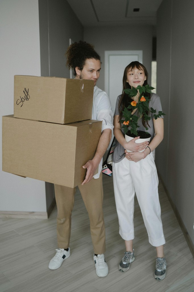 A couple justing moving in into an apartment