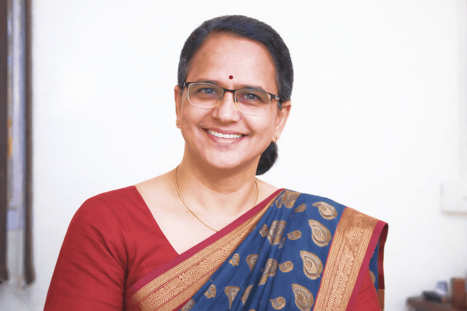 man standing in front of window