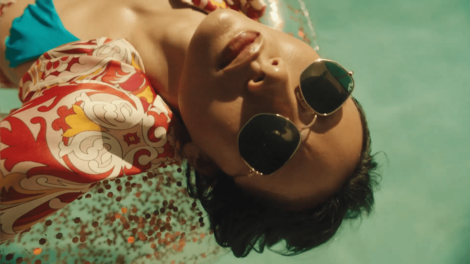 Modern architectural walkway with angled roof and sunlight.